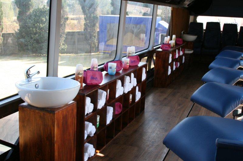 Bus interior fitted out as a mobile spa for a brand activation