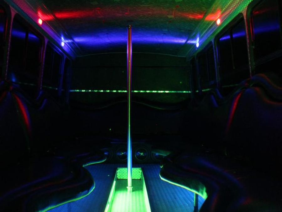 Party bus aisle lit with green LED floor lighting