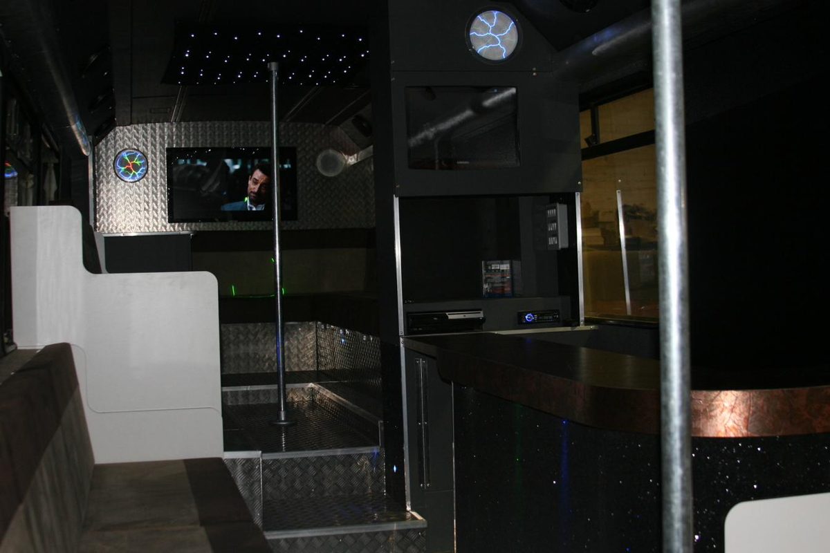 Fitted bar counter inside a party bus