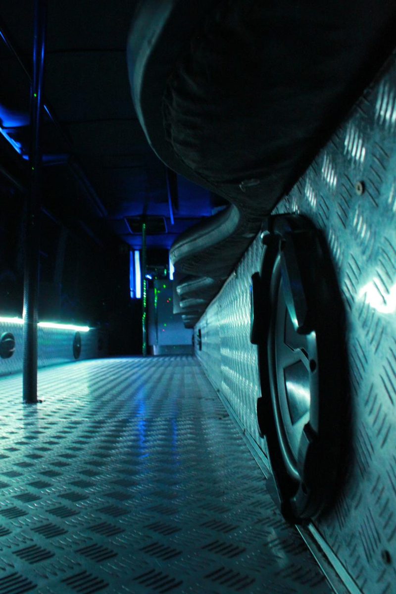 Blue LED underglow lighting inside a party bus